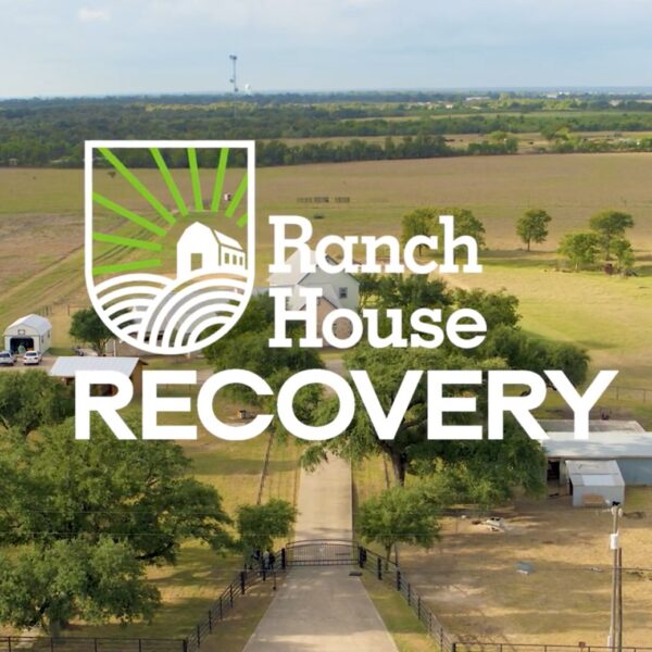 Ranch House Recovery's residential ranch rehab center with their logo laying over the top.